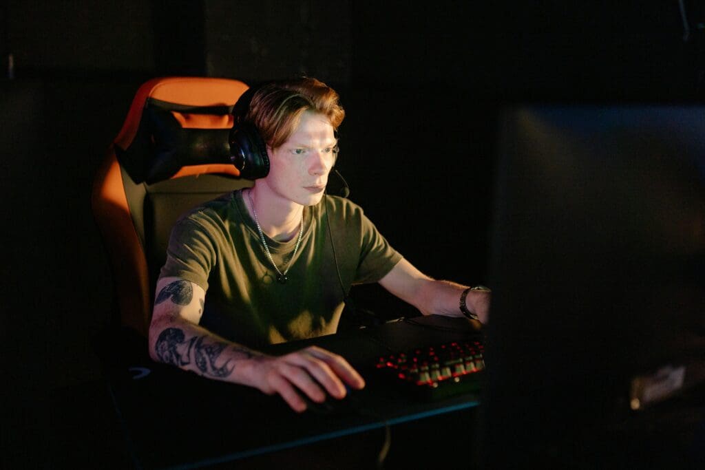 A young man playing a computer game