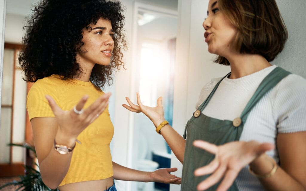 Two women arguing.