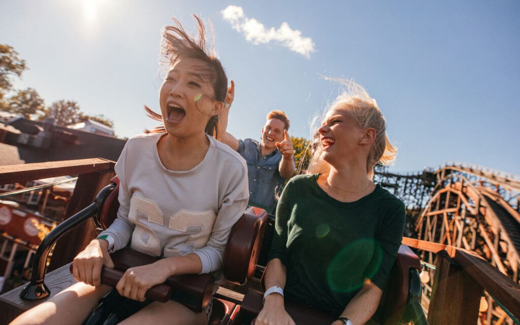 young people on rollercoaster
