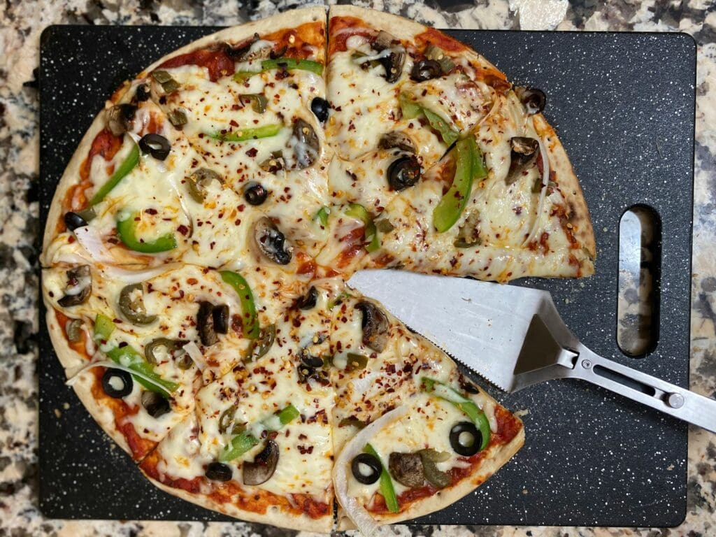 pizza with green and red bell pepper and cheese