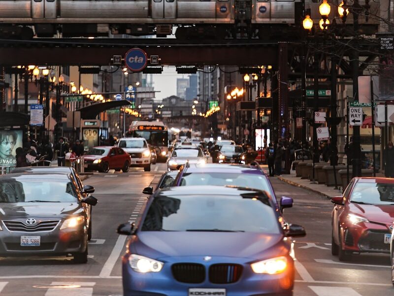 cars on road near buildings during daytime