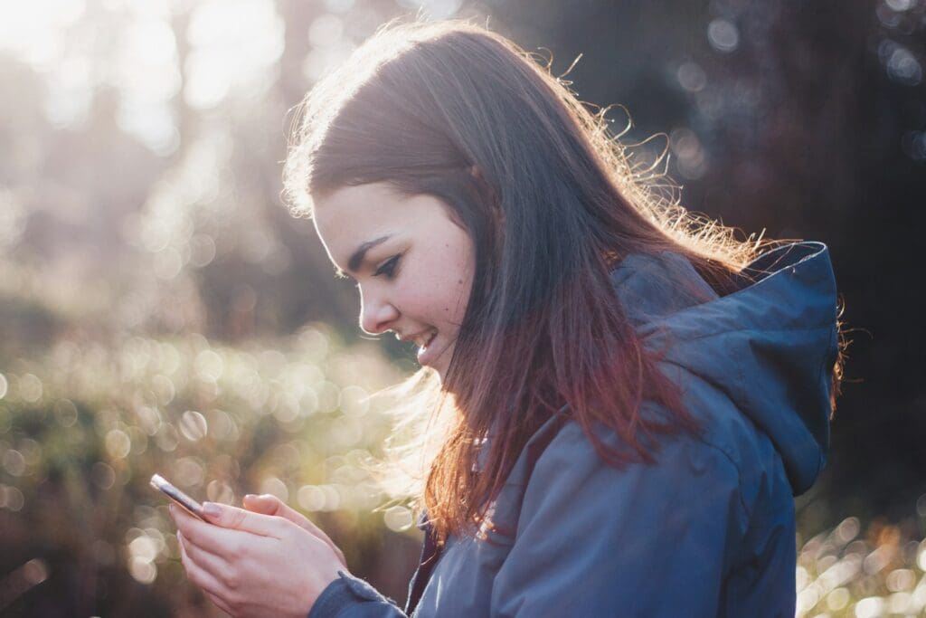 angry woman holding phone