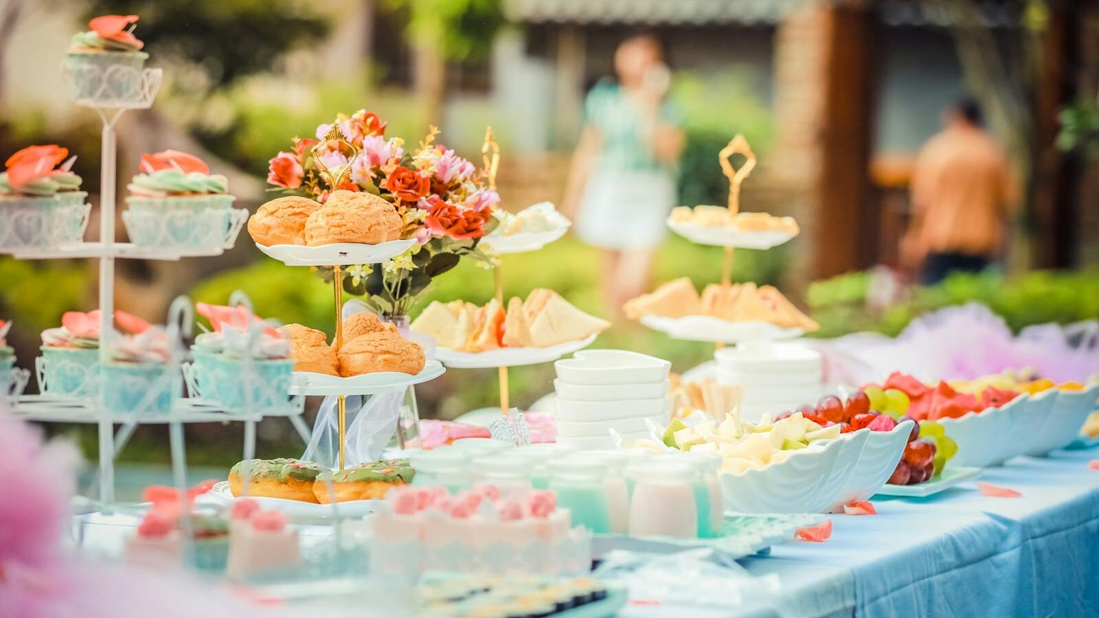 Various Desserts on a Table covered with Baby Blue Cover