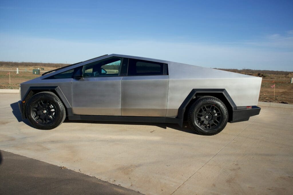 a futuristic car parked in a parking lot