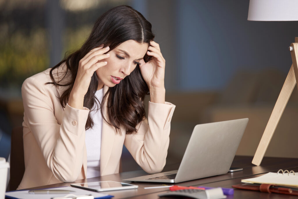 Stressed woman in the office