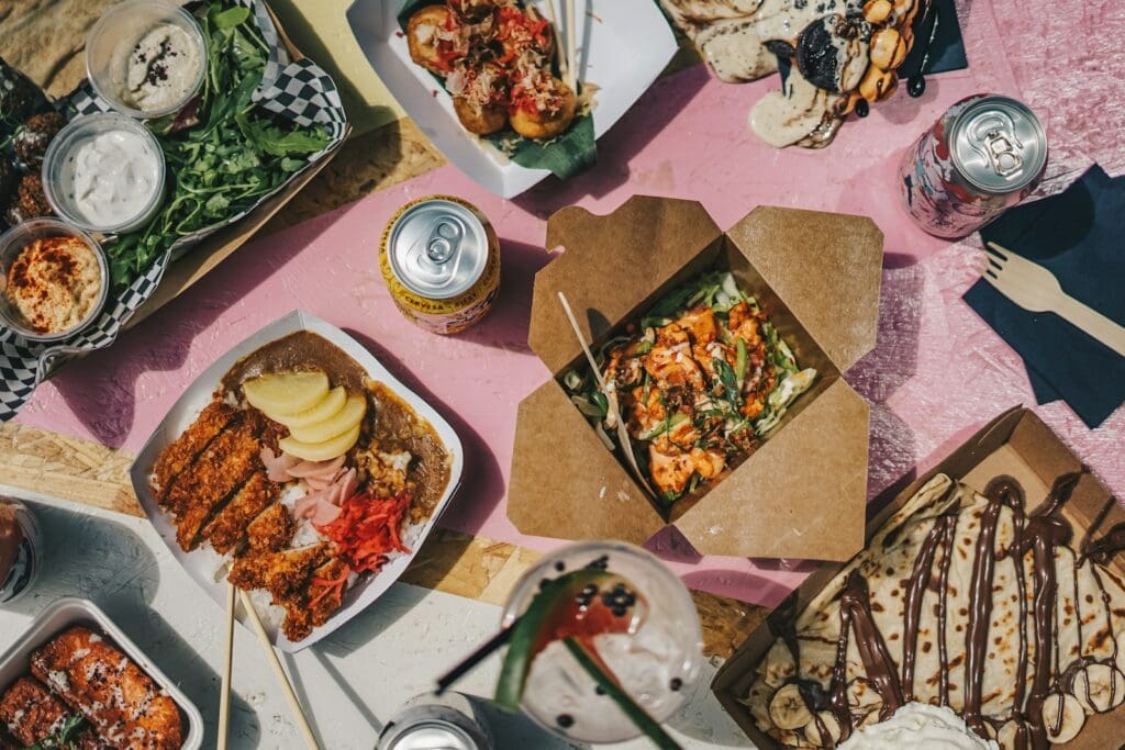 a table filled with lots of food and drinks