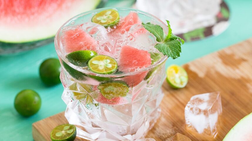 sliced watermelon with lemon on shot glass