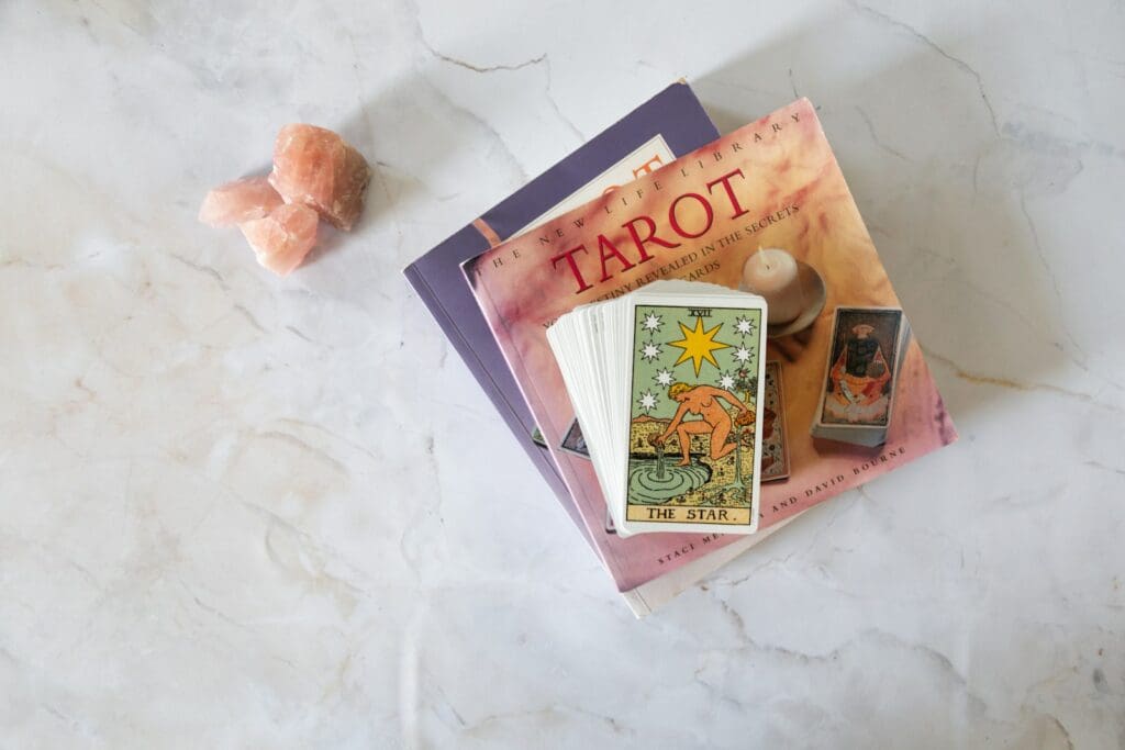 tarot book and star card