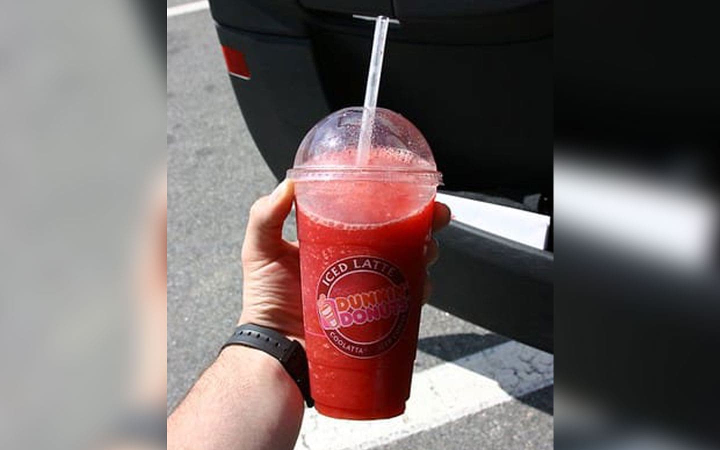 Hand holding Strawberry Coolatta