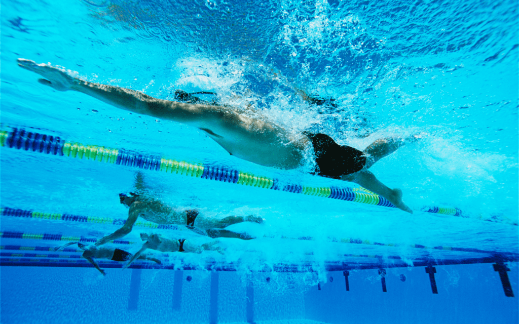 Adobe Stock, swimmers doing freestyle