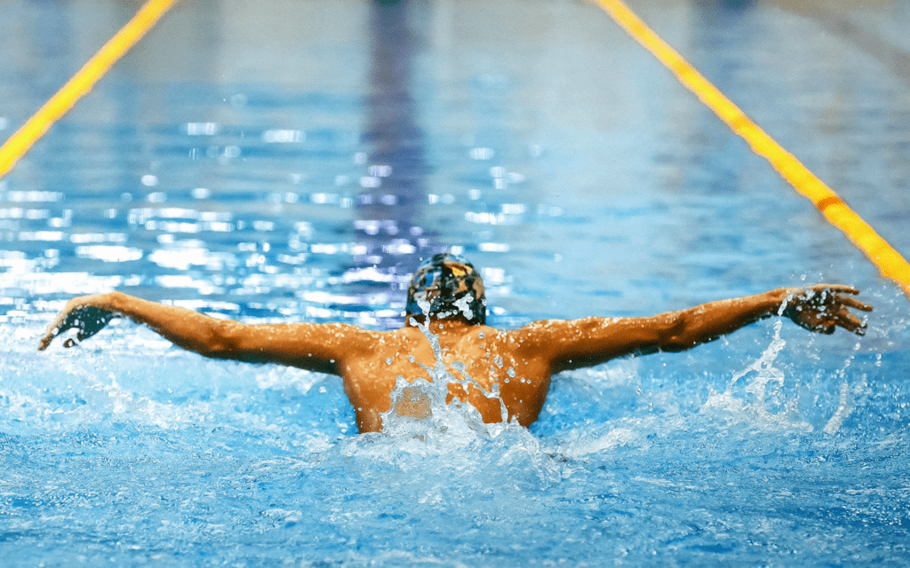 Adobe Stock, swimmer doing butterfly