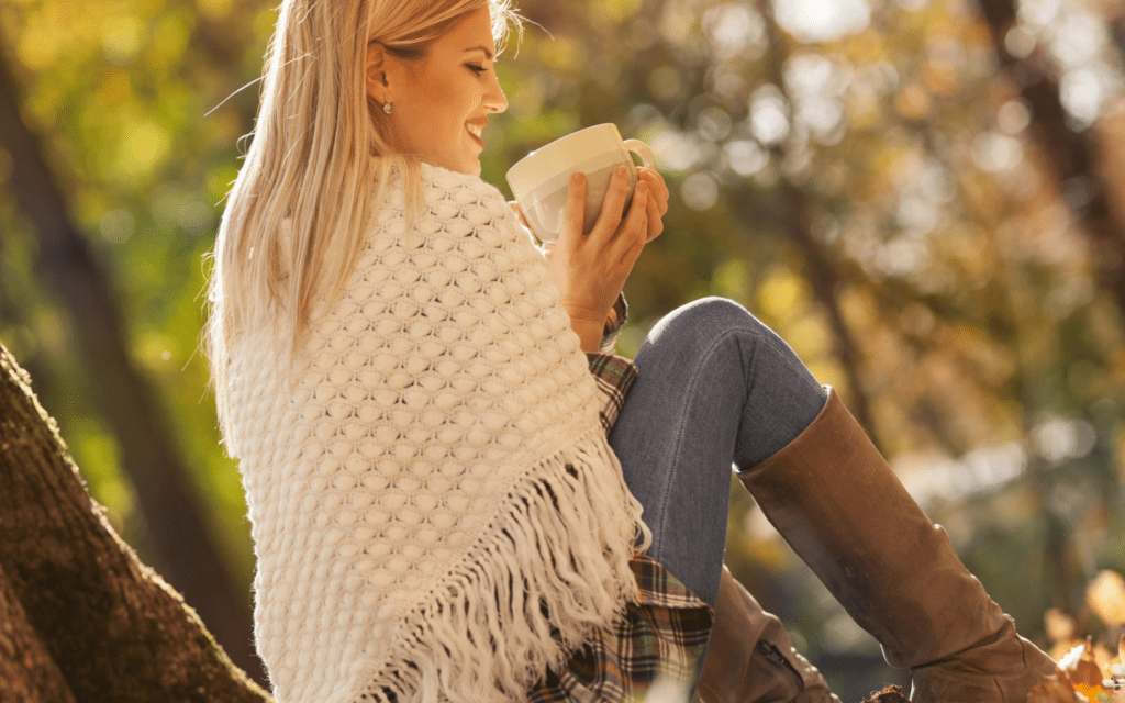 Adobe Stock, woman drinking coffee in fall