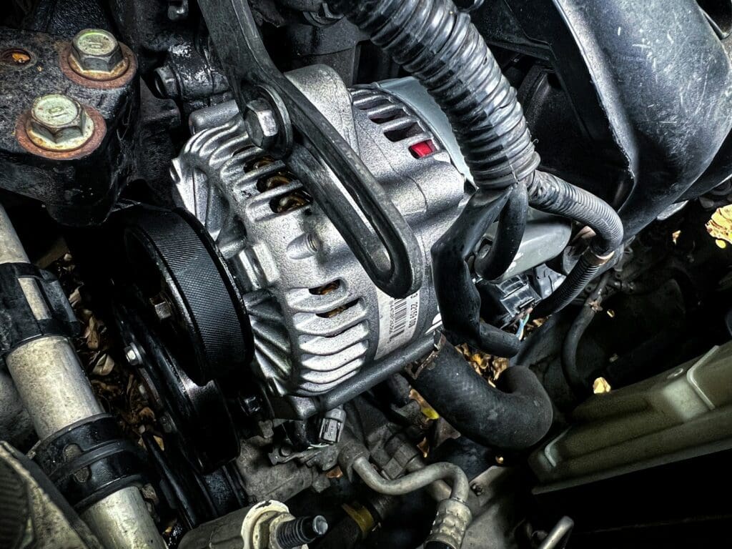 a car engine with a black hood