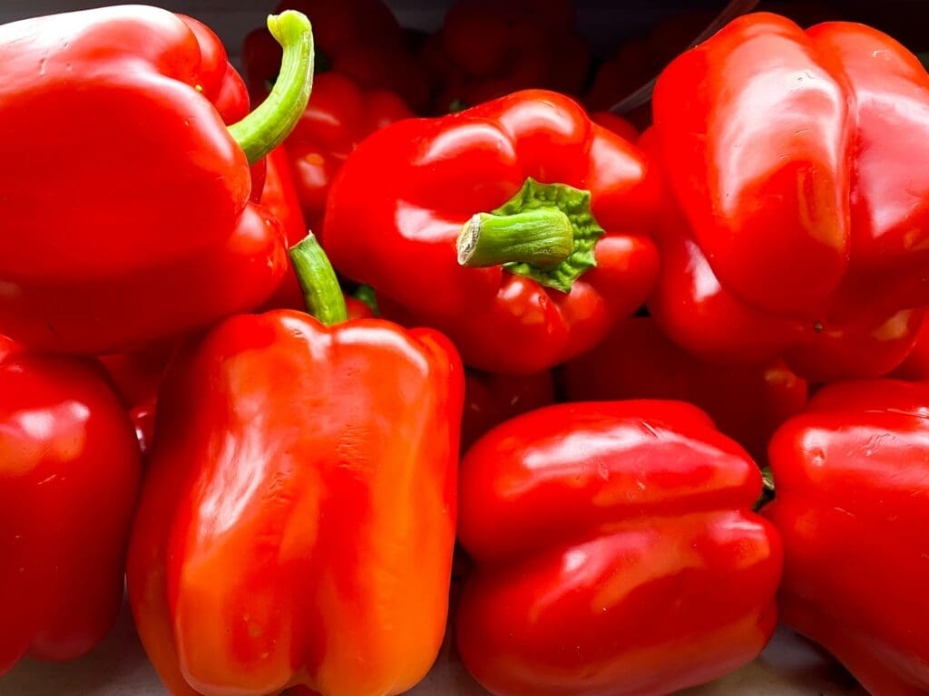 a group of red bell peppers