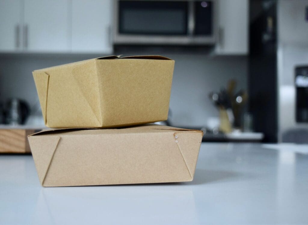 brown cardboard box on white table