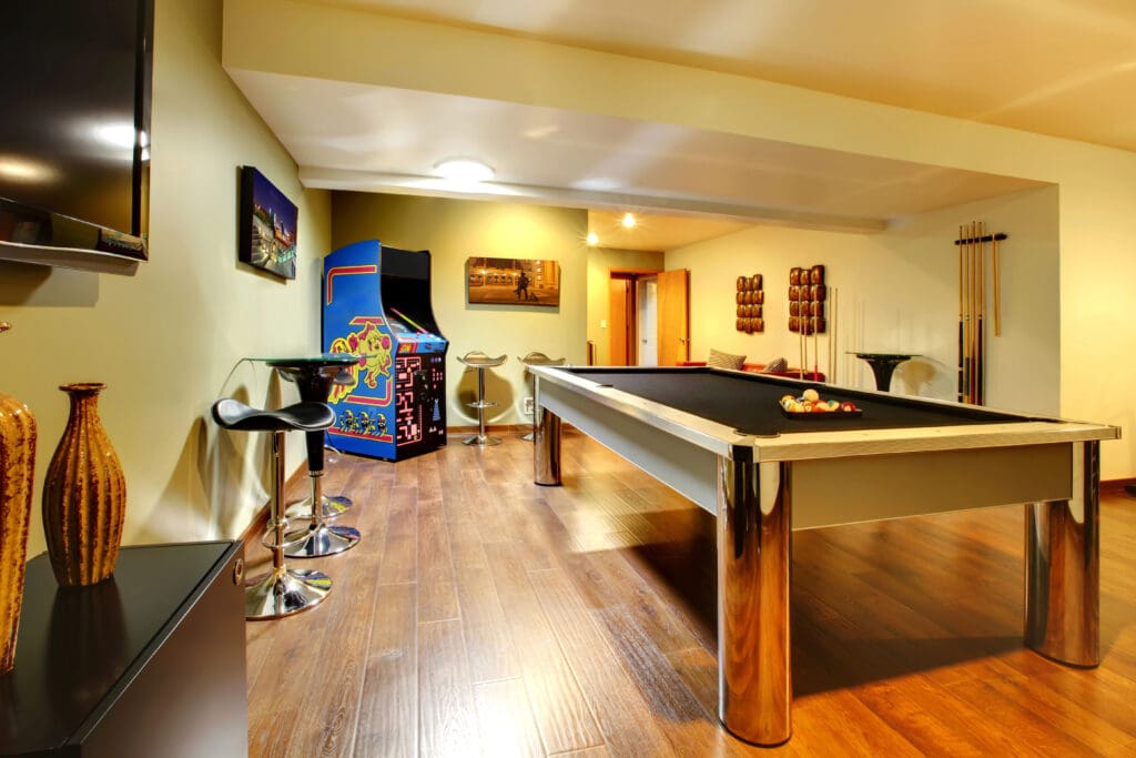 Play party room home interior with pool table.