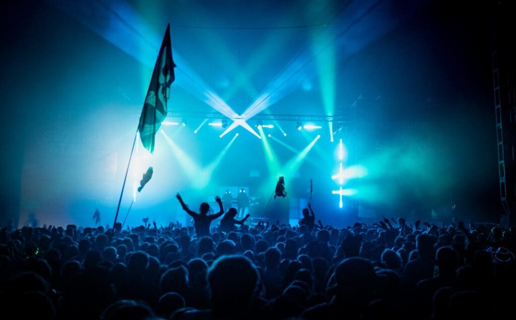 A crowd of people standing on top of a stage