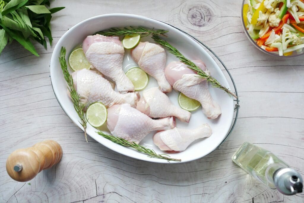 sliced vegetables on white ceramic bowl with chicken