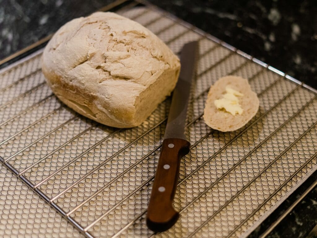 bread on white and black checkered textile