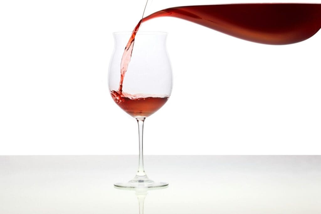 clear wine glass with red wine