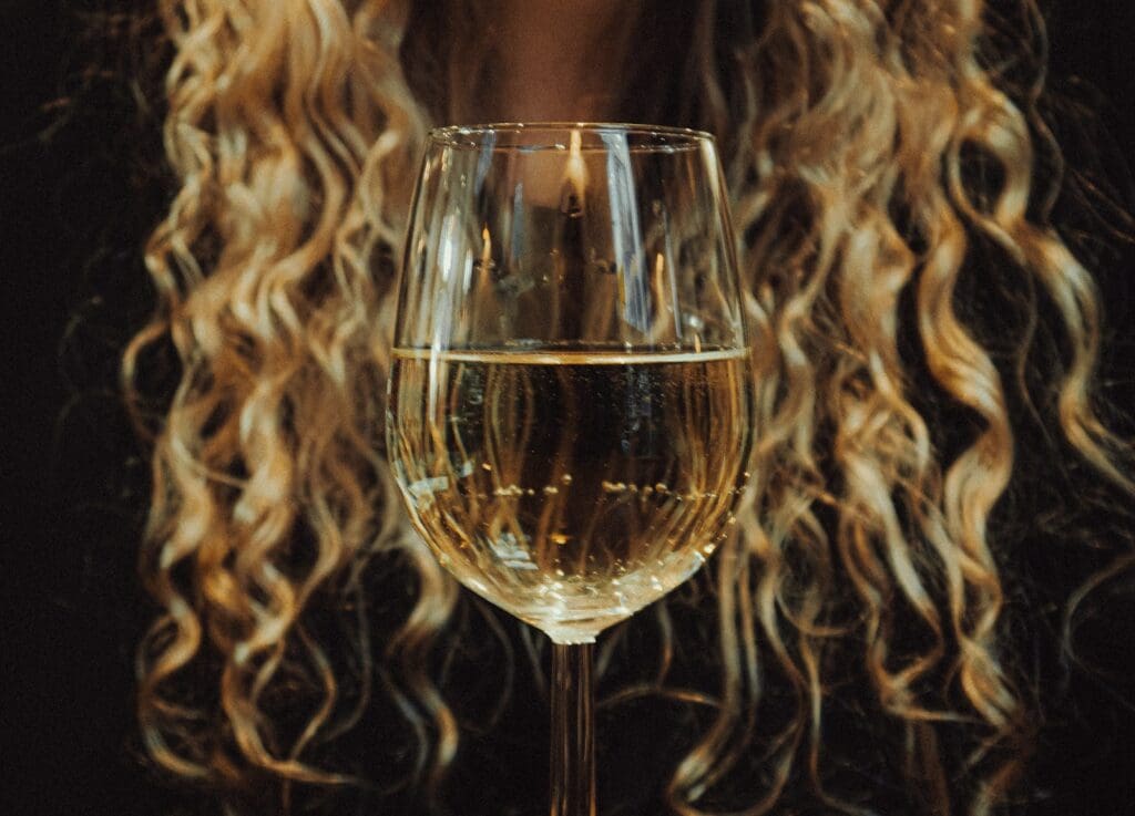 a close up of a glass of wine