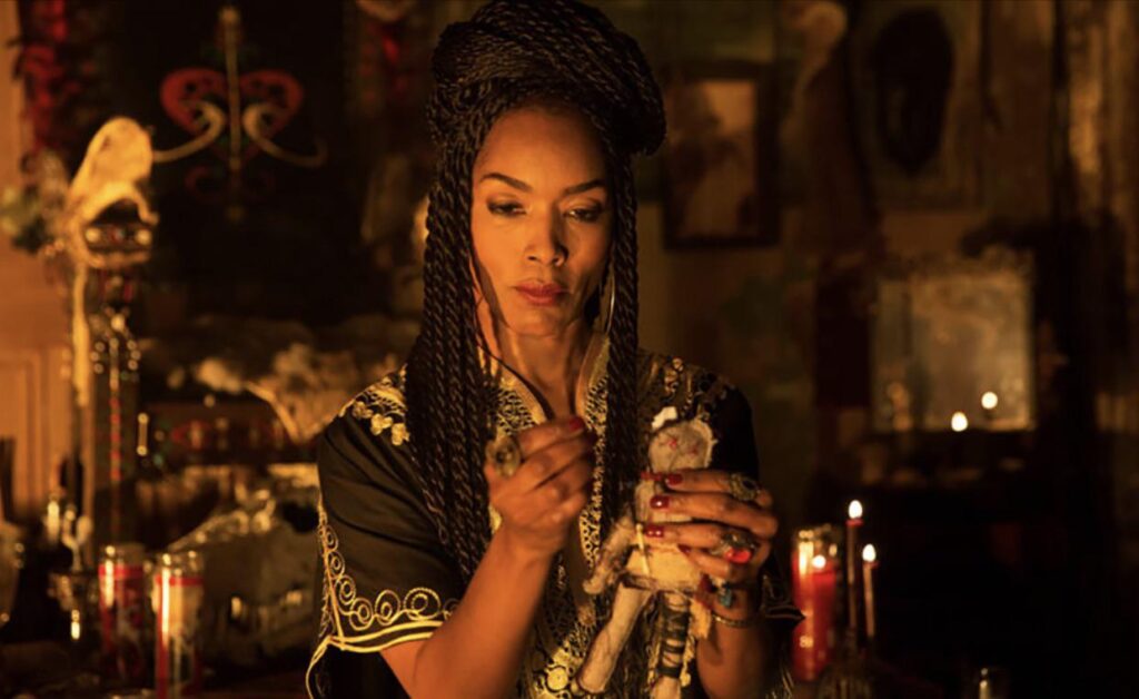 Angela Bassett as Marie Laveau