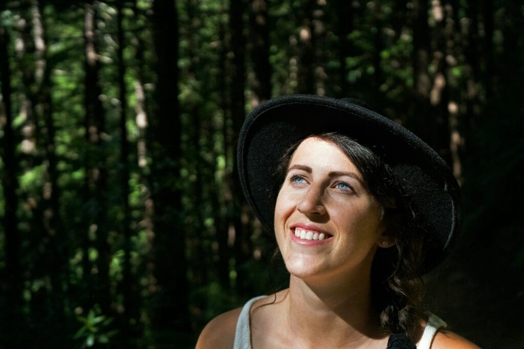 shallow focus photography of woman in white tank top