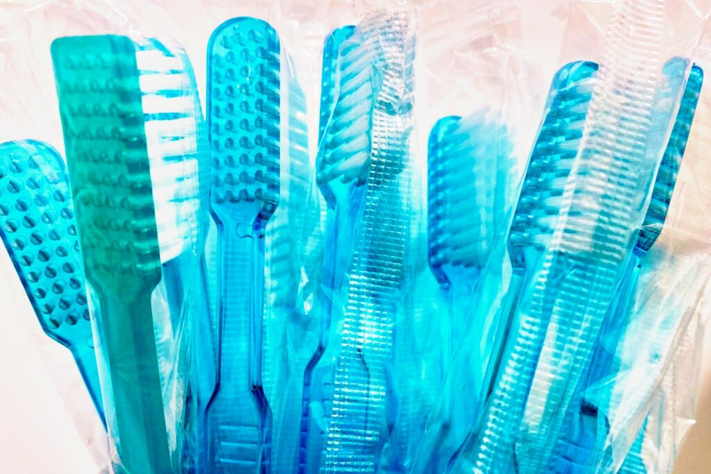 blue and white plastic toothbrush