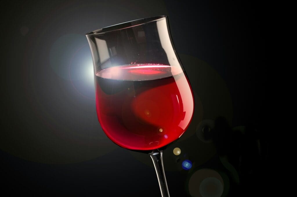 clear wine glass with red wine