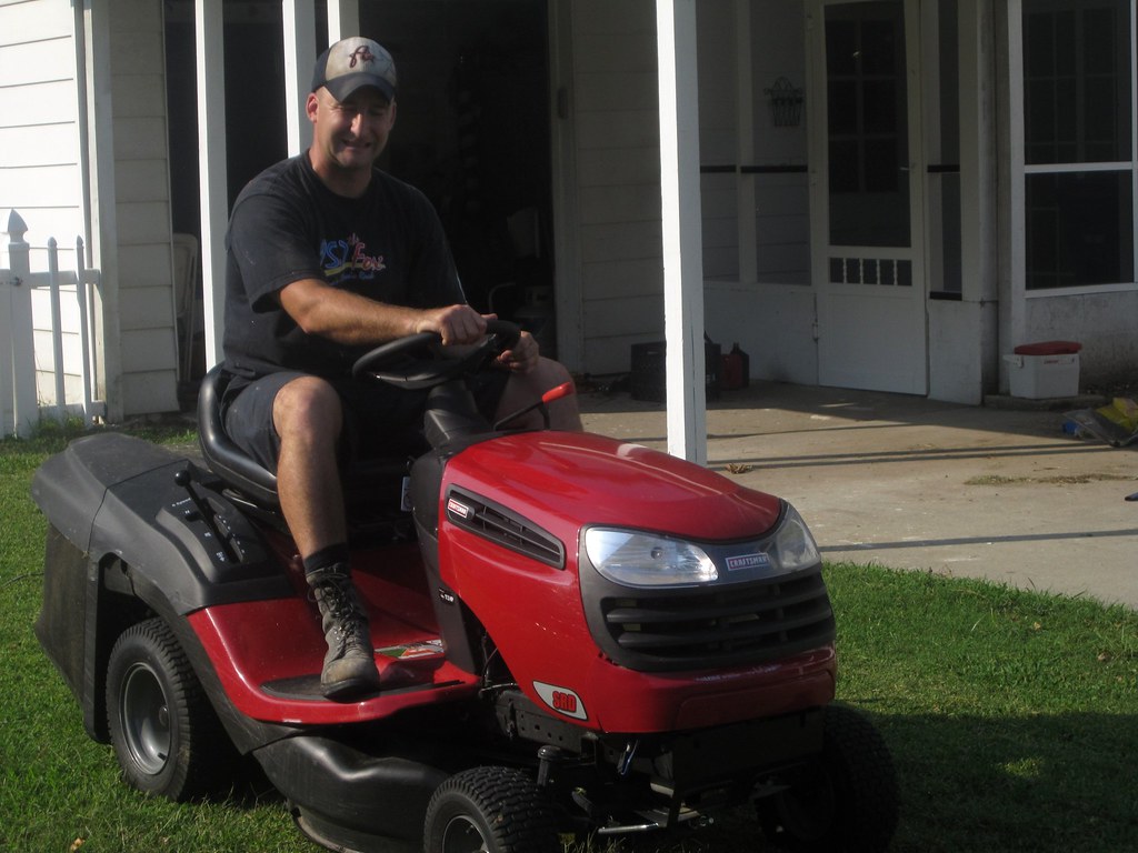 A man on a riding mower