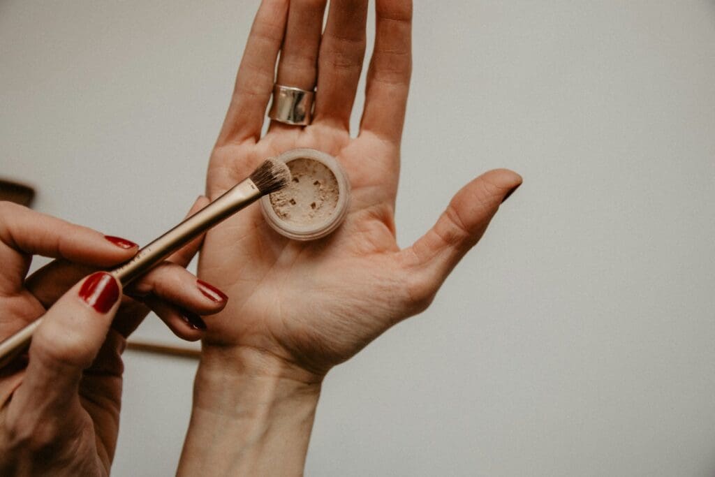 Person holding makeup