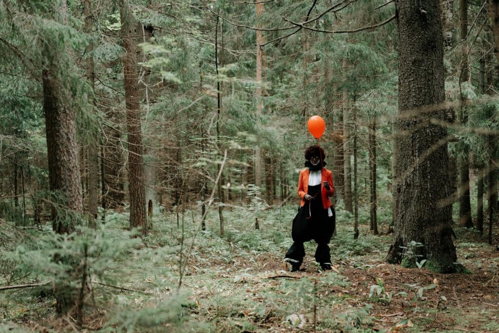 Scary Clown holding a Balloon