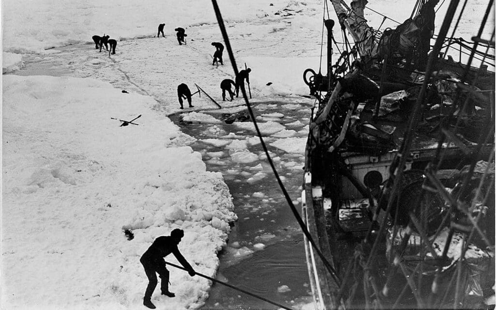 Crew members working to free the ship from the ice