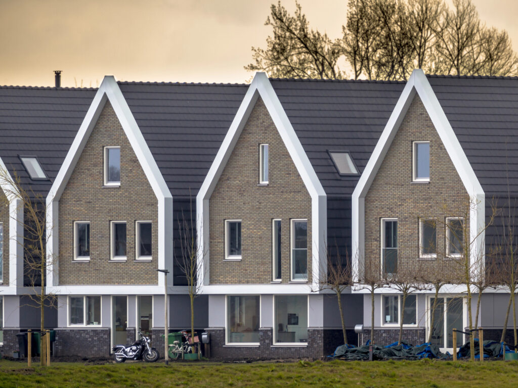 Row of modern houses at sunset