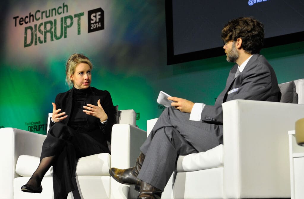 Theranos Chairman, CEO and Founder Elizabeth Holmes (L) and TechCrunch Writer and Moderator Jonathan Shieber speak onstage at TechCrunch Disrupt at Pier 48 on September 8, 2014 (14995888227)