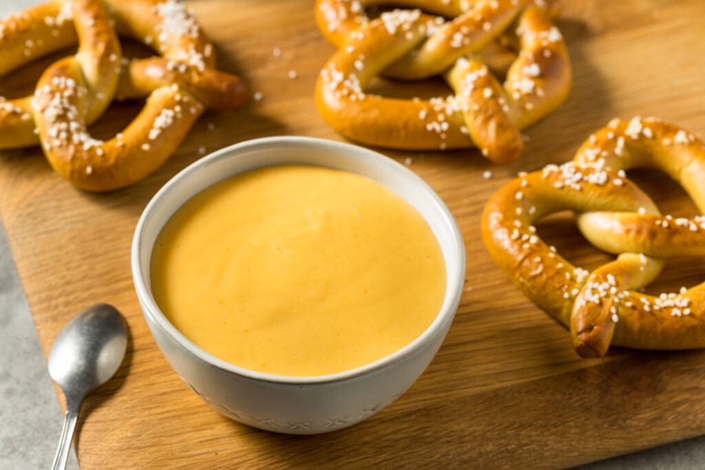 Homemade Beer Cheese Dip with Pretzels in a Bowl