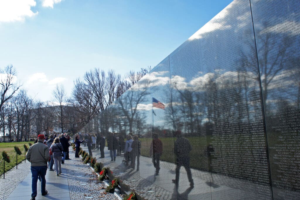 US flag reflexion on Vietnam Veterans Memorial 12 2011 000124