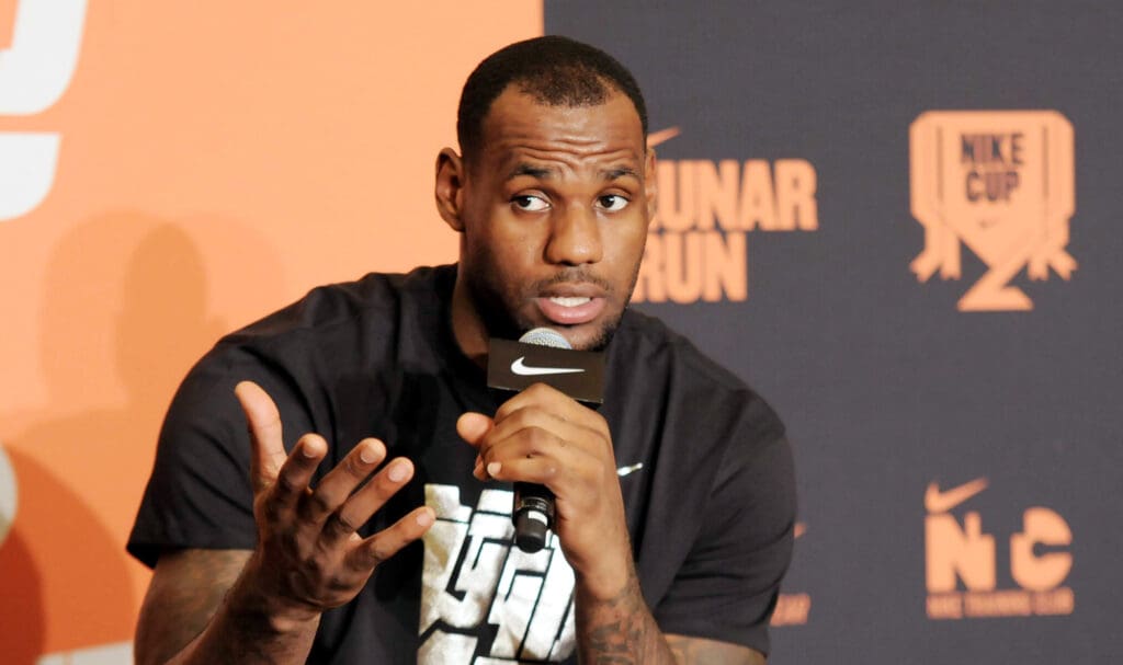 NBA star LeBron James is pictured in a visit to a basketball training camp during his China tour in Shanghai, China, 18 August 2011.