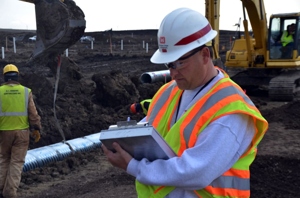 USACE quality assurance representative monitors construction