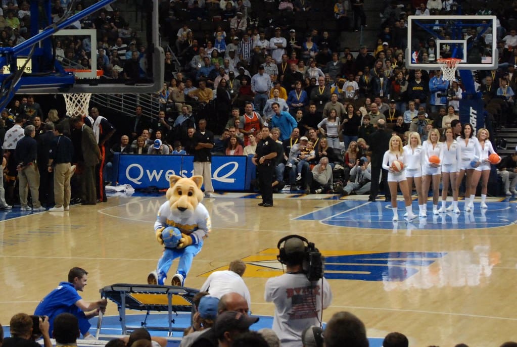 Mascot Rocky dunking the basketball