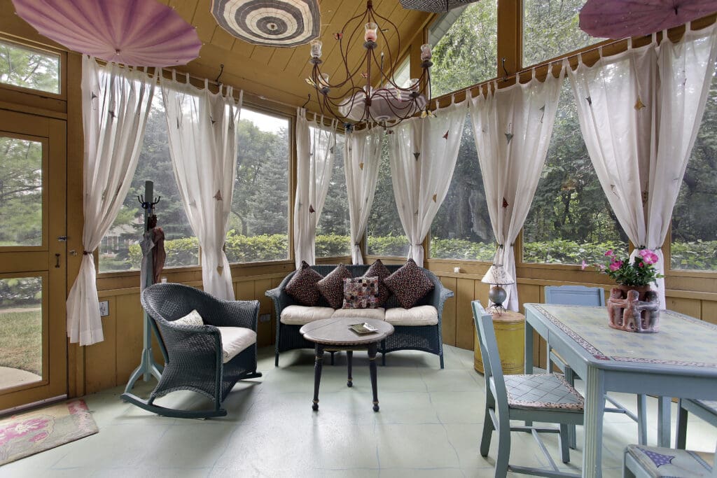 Porch with white curtains