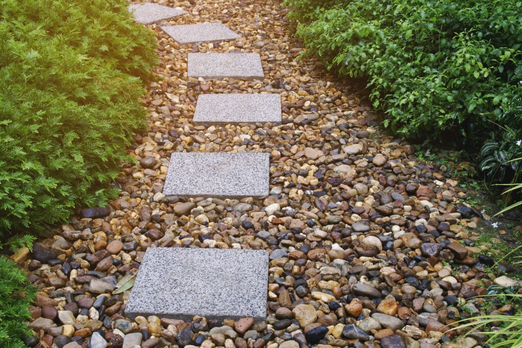Stepping Walkway among Gravel Lawn in the Garden