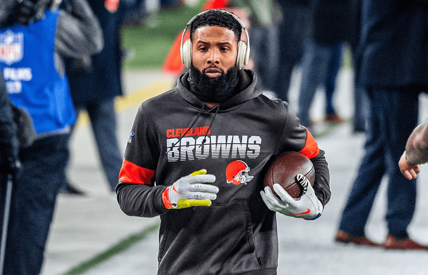 Odell Beckham Jr. with headphones holding ball