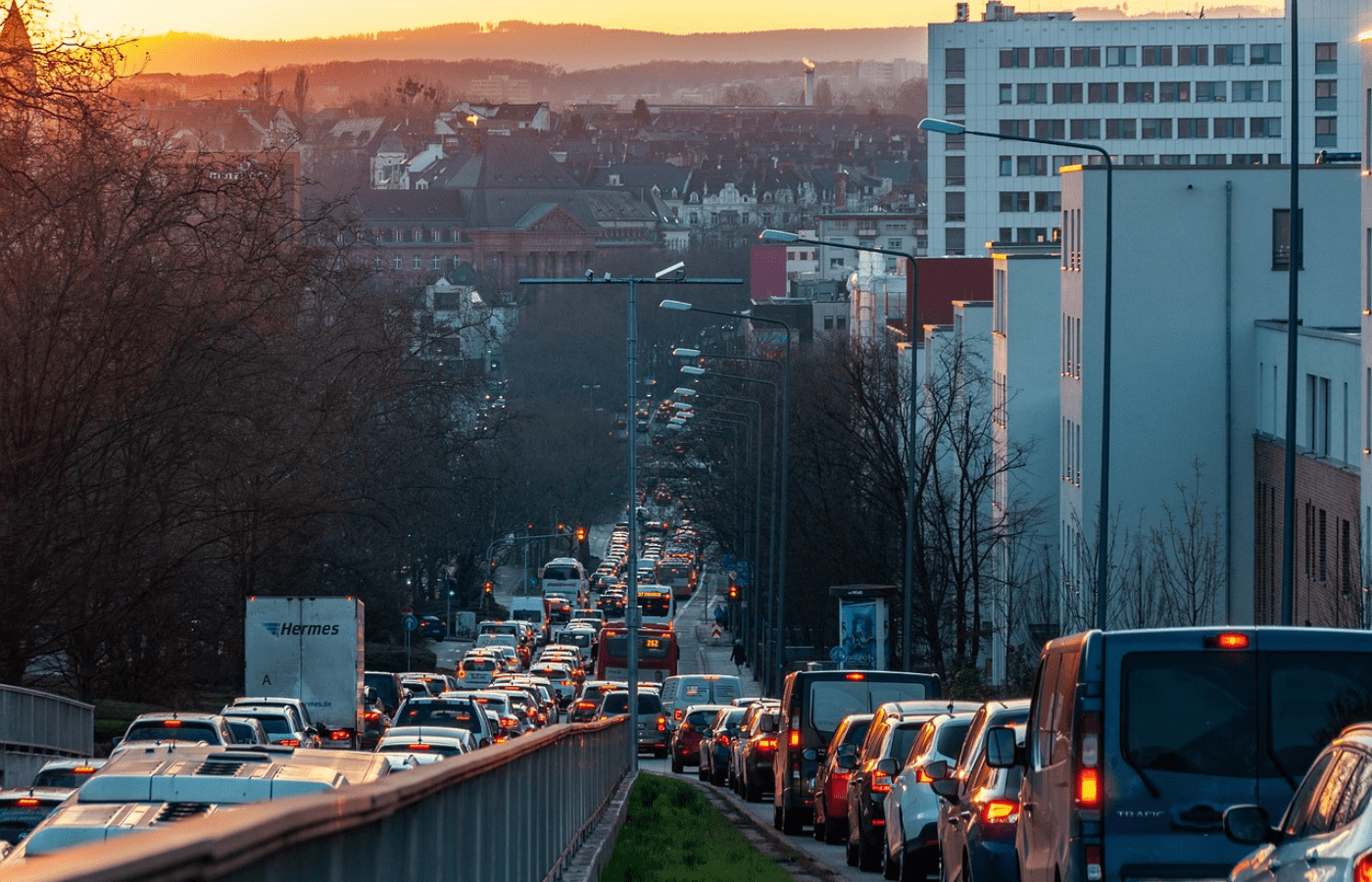 City traffic congestion during sunset with cars