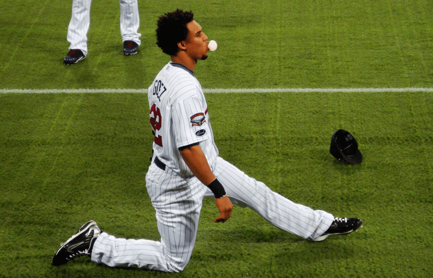 Carlos Gomez stretching a leg