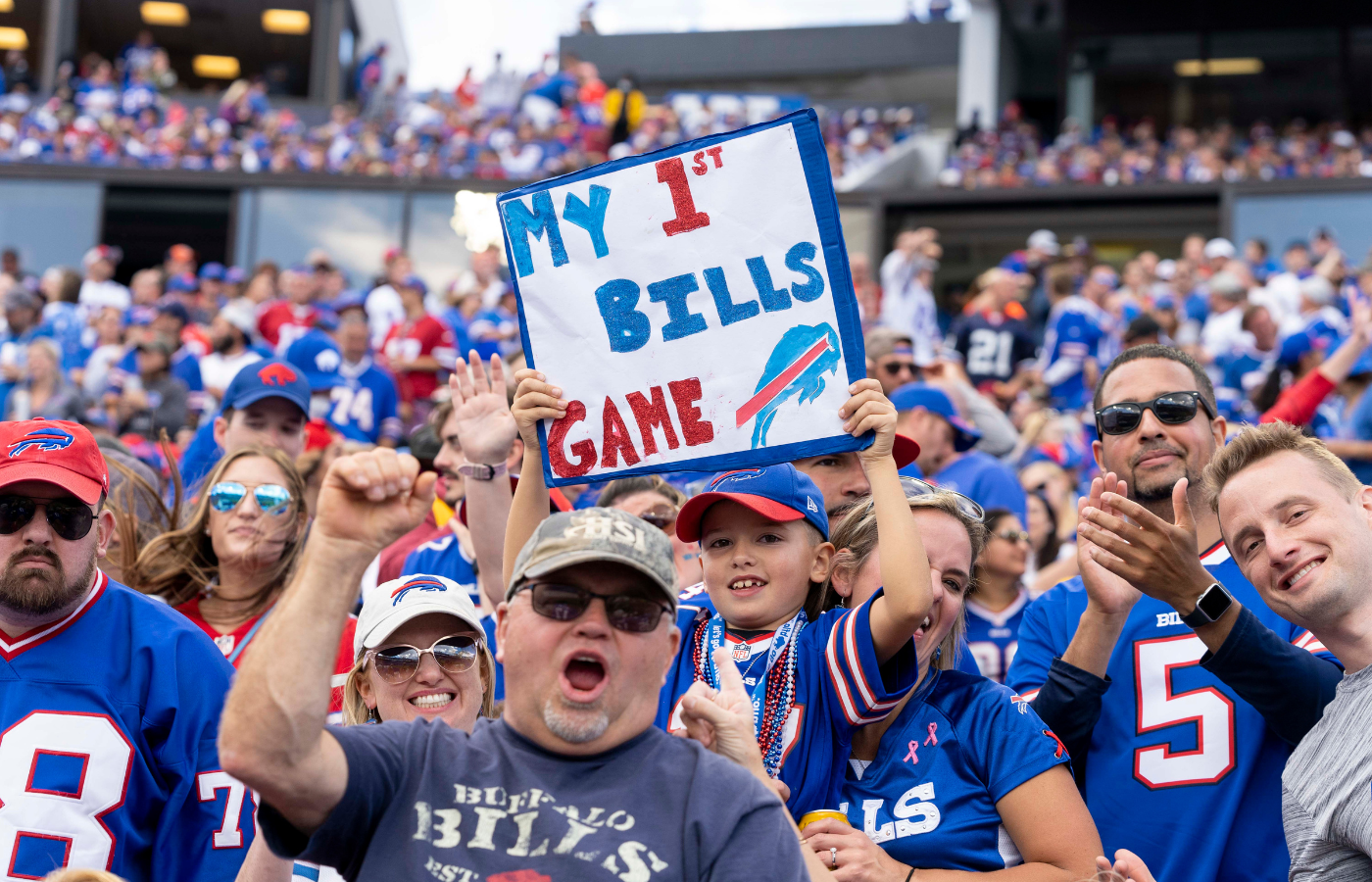 Excited Buffalo Bills fans cheering at game