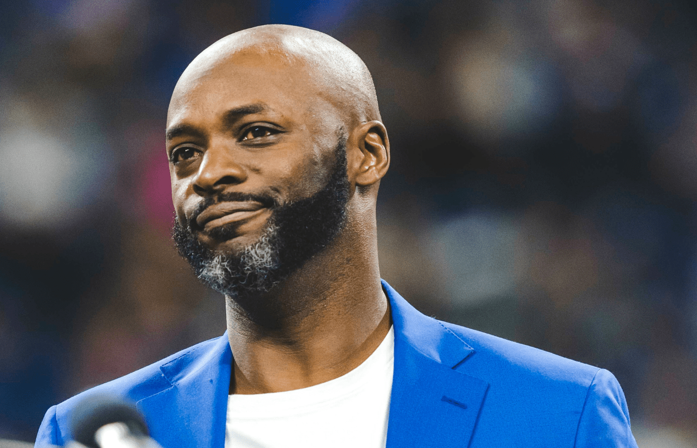 Reggie Wayn in a Blue suit