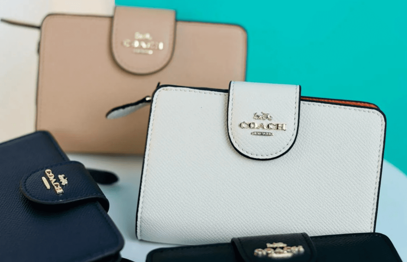 A Coach Wallets in Different Colors