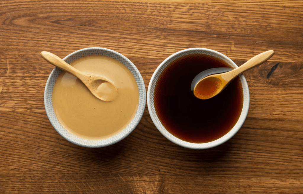 Tahini and soy sauce in bowls