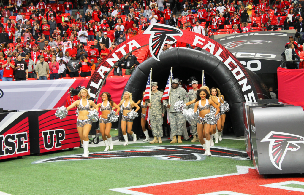 Falcon Fans cheer as Atlanta Falcons make grand entrance